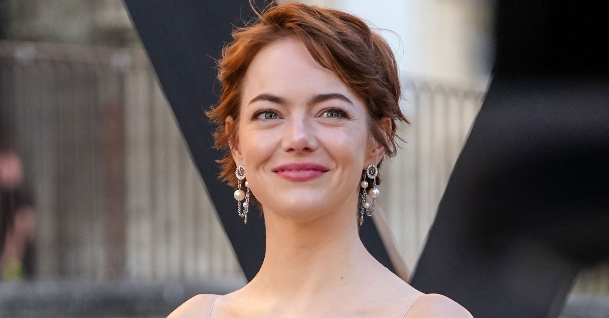 Emma Stone Just Wore the Dress Trend You'll See on the Chicest Wedding Guests This Summer