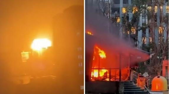 Missili e droni dalla Russia su Kiev: esplosioni e un palazzo che brucia