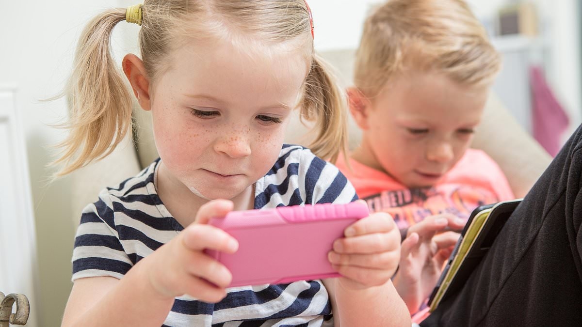 Parents warned to limit their children's screen time, as research finds youngsters glued to smartphones and tablets have smaller brains and lower IQs