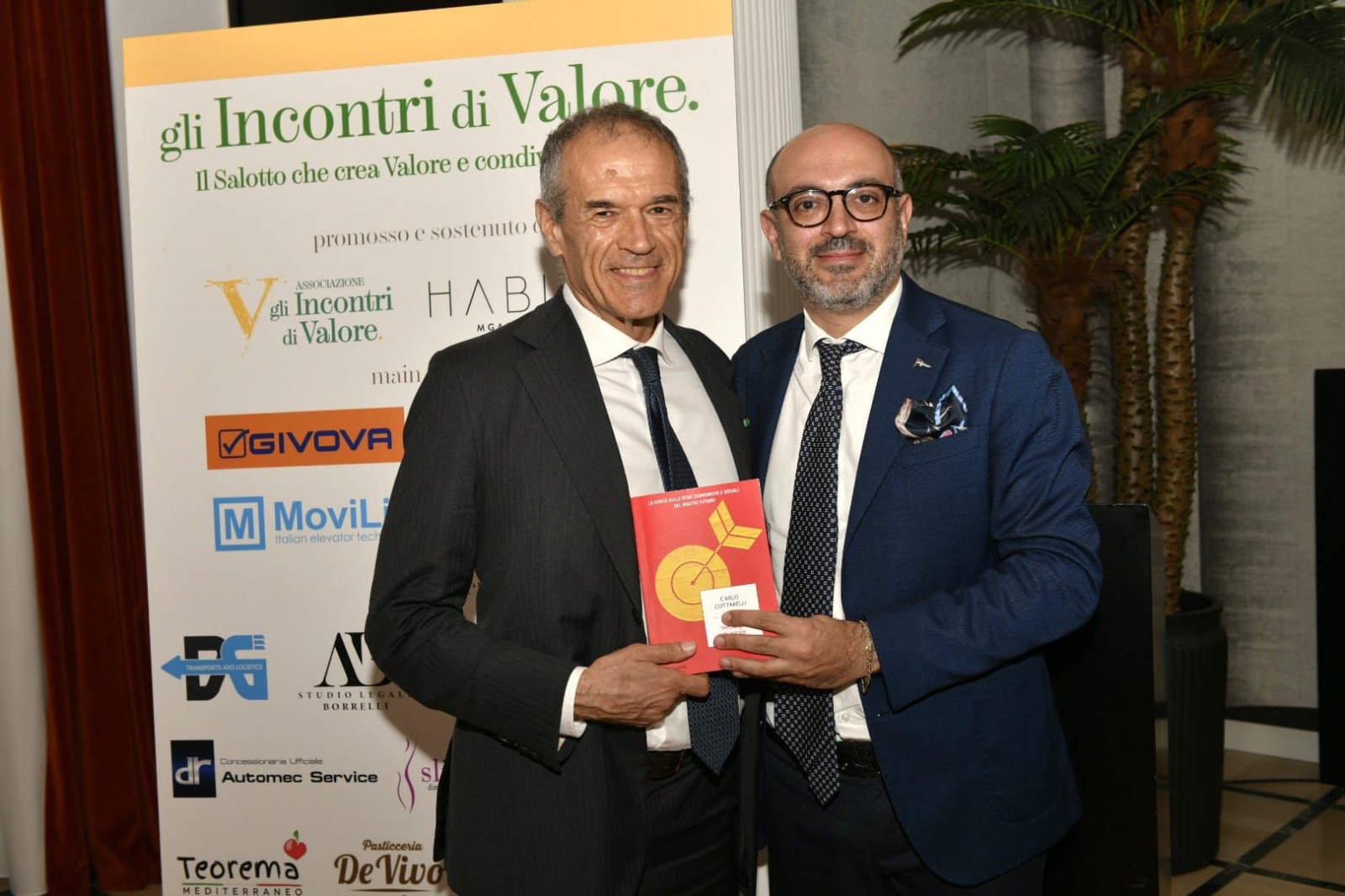 Encuentros Valiosos, en el salón de Nicola Ruocco en Pompeya Carlo Cottarelli y Patrizia Gucci