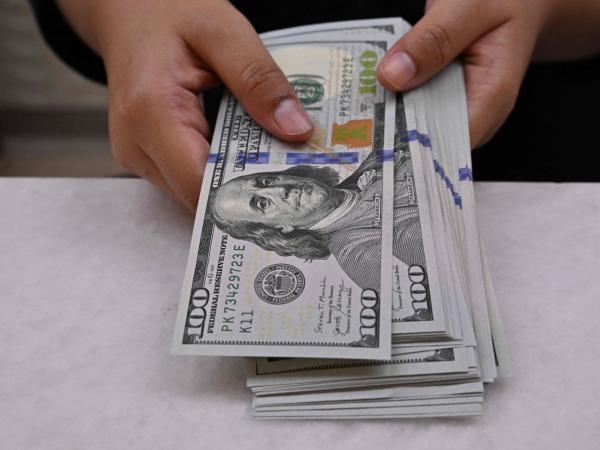 Der Dollar schloss am Dienstag in Erwartung der Ergebnisse des ersten Halbjahres niedriger.