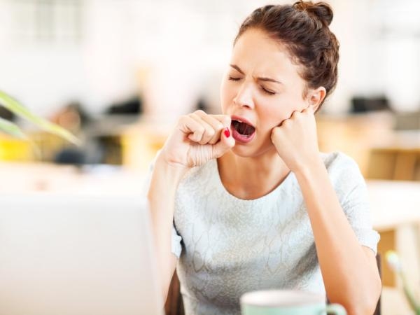 What does it mean when someone yawns when talking to you?